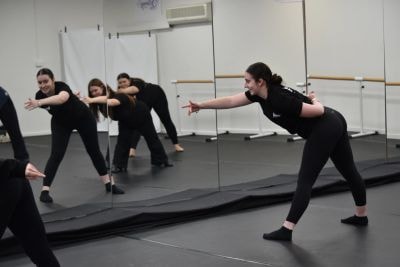 Dance class rehearsing choreography at Studio 8 Dance